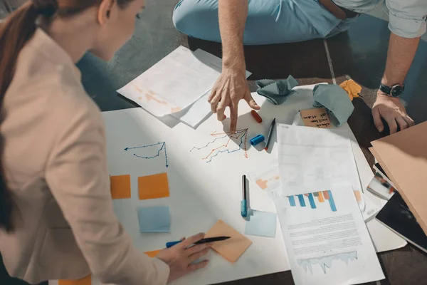 Business people working with graphs — Stock Photo