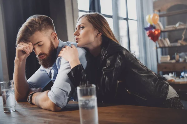 Man and woman with hangover — Stock Photo