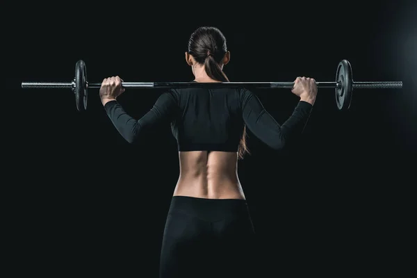 Entrenamiento de deportista con barra - foto de stock