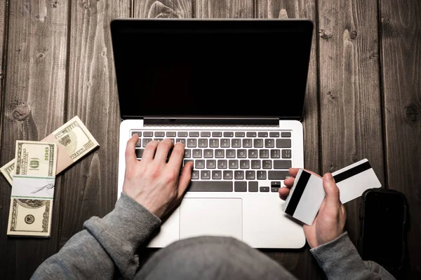 Hacker using laptop — Stock Photo