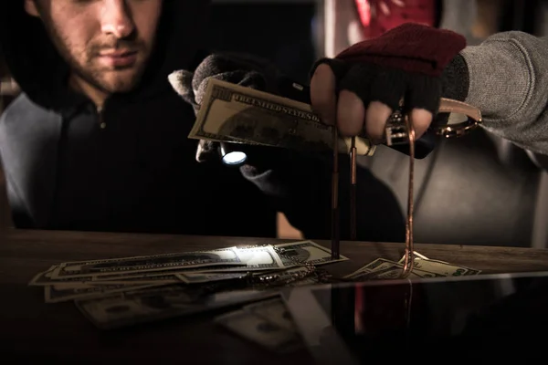 Robbers stealing money — Stock Photo