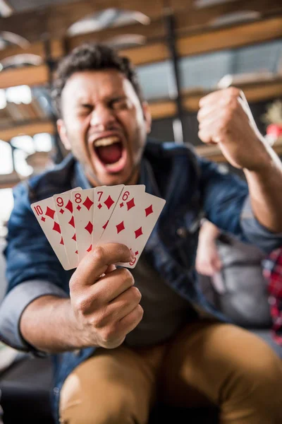 Triumphing man with street flash — Stock Photo