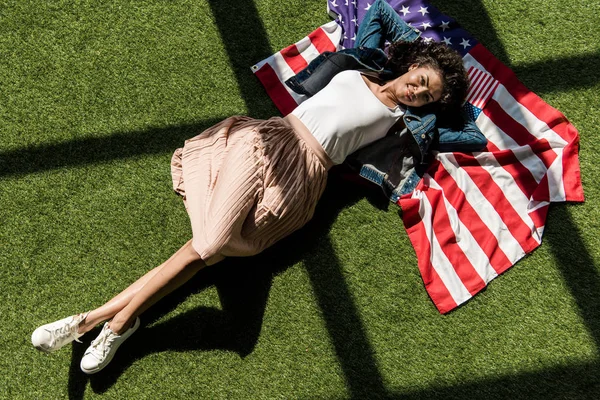 Woman resting on grass — Stock Photo