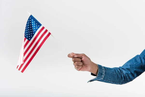 Mano sosteniendo bandera americana — Stock Photo