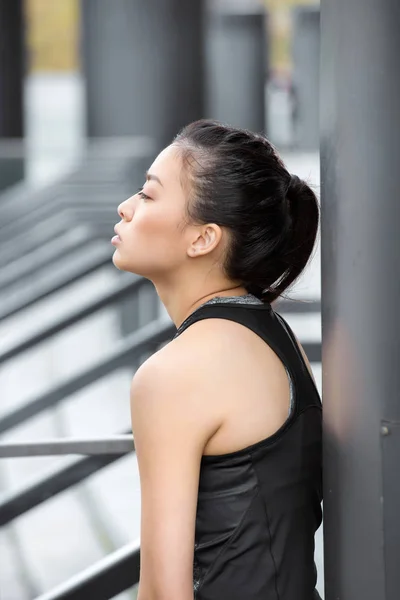 Sportswoman training on stadium stairs — Stock Photo