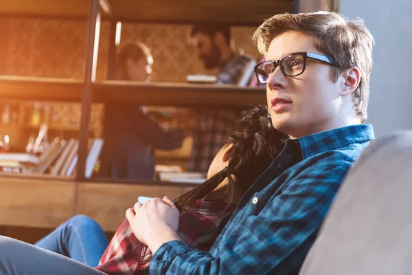 Couple resting on couch — Stock Photo