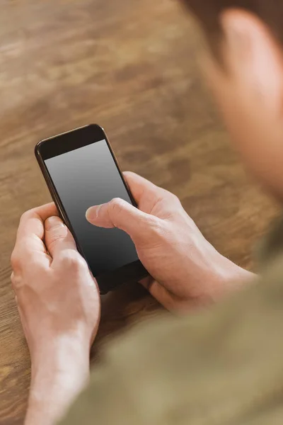 Smartphone with blank grey screen — Stock Photo