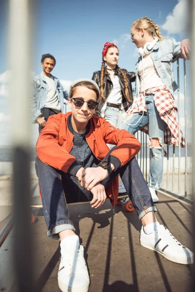 Teenagers spending time at skateboard park — Stock Photo