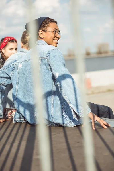 Teenagers spending time at skateboard park — Stock Photo