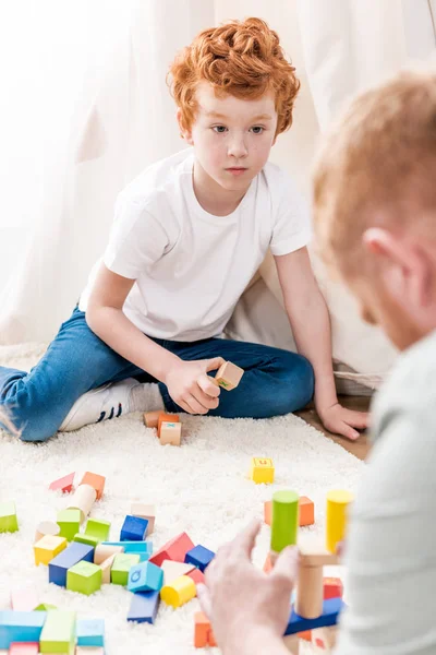 Father and son playing with constructor — Stock Photo