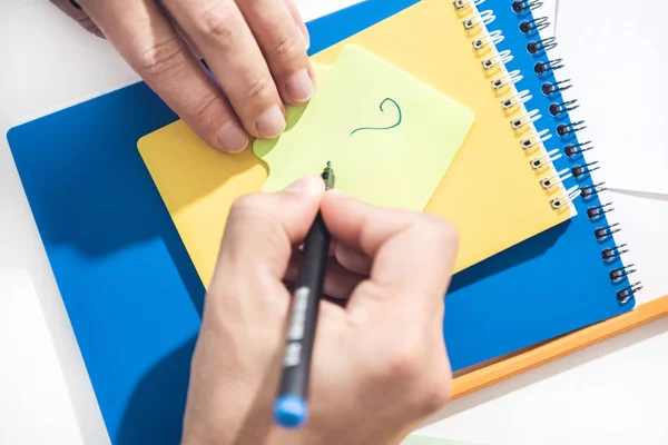 Human hands drawing exclamation mark — Stock Photo