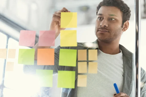 Casual businessman working at modern office — Stock Photo