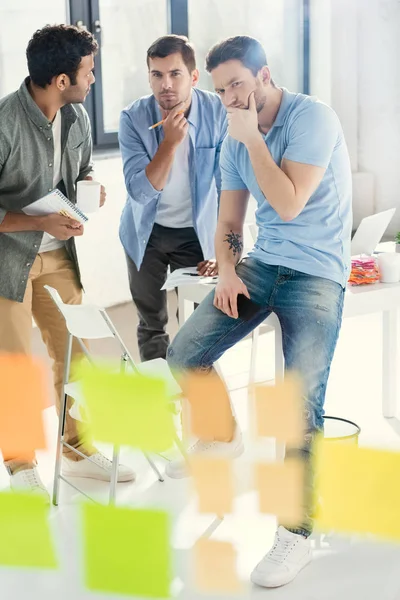 Casual businessmen working at office — Stock Photo