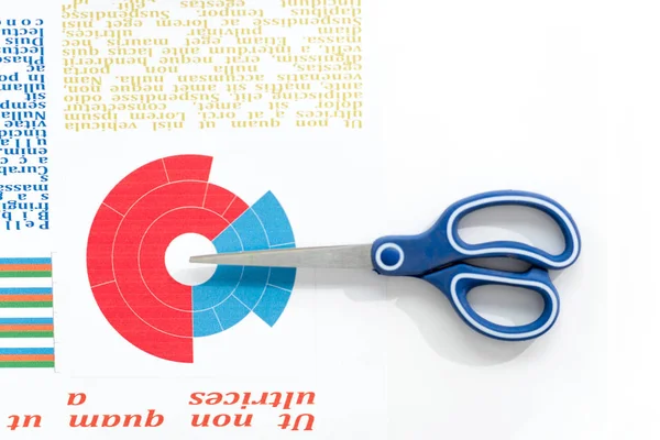 Scissors and business chart — Stock Photo