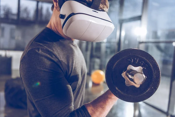 Man exercising with dumbbell — Stock Photo