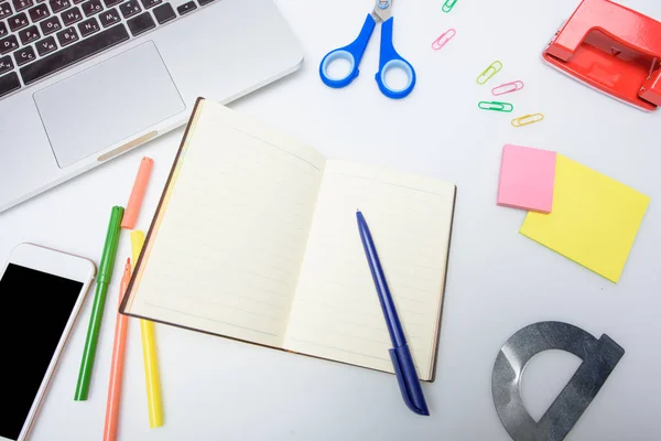 Copybook and school supplies — Stock Photo