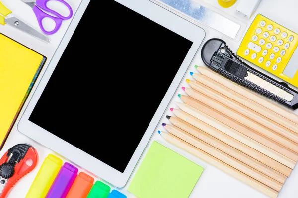 Office supplies and digital tablet — Stock Photo