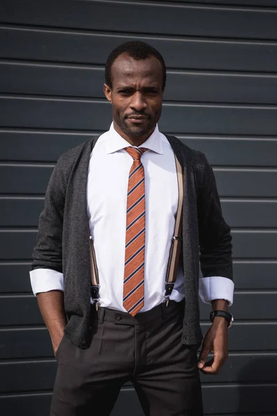 Young confident african american businessman standing outdoors — Stock Photo