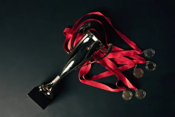 Trophies on black floor — Stock Photo