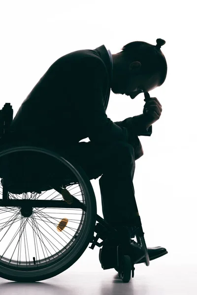 Depressed man in wheelchair — Stock Photo