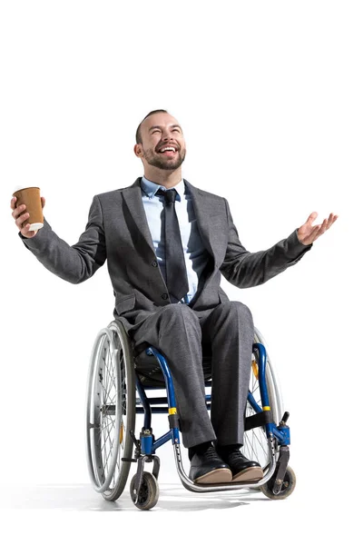 Homme d'affaires handicapé avec café à emporter — Photo de stock