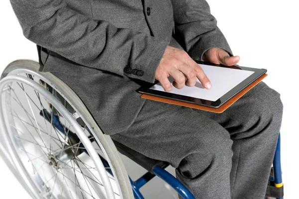 Physically handicapped businessman with digital tablet — Stock Photo