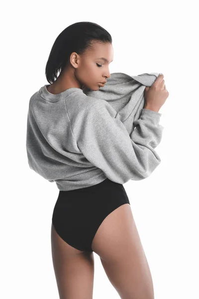 Giovane donna in body e maglione — Foto stock