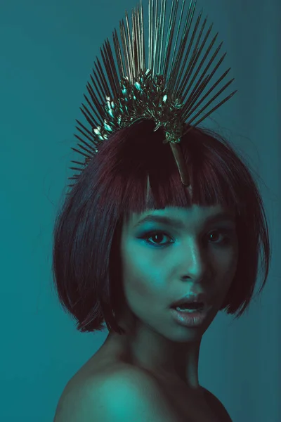 Astonished african american woman in headpiece — Stock Photo