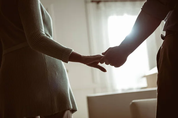 Senior couple holding hands — Stock Photo