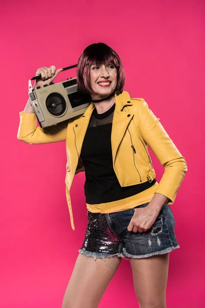Senior woman with tape recorder — Stock Photo