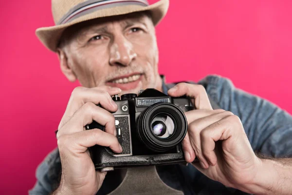 Man with retro photo camera — Stock Photo