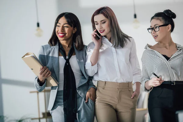 Young businesswomen in office — Stock Photo