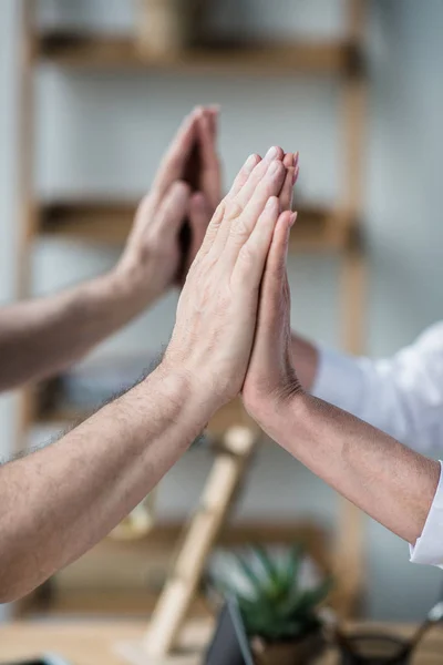 People giving double high five — Stock Photo