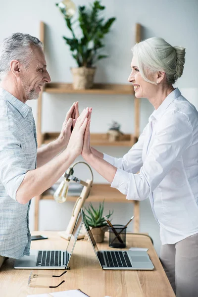 People giving double high five — Stock Photo