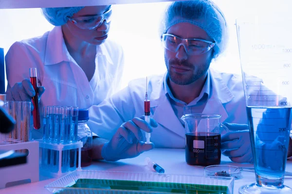 Scientists during work at laboratory — Stock Photo