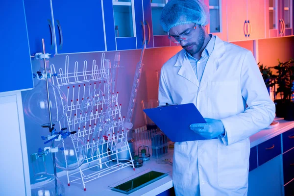 Scientists during work at laboratory — Stock Photo