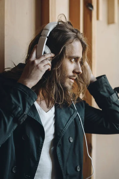 Young man in headphones — Stock Photo