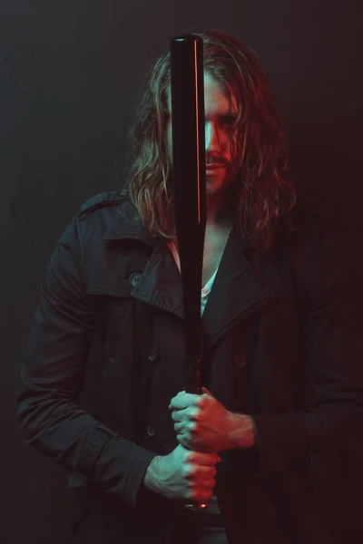 Young man with baseball bat — Stock Photo