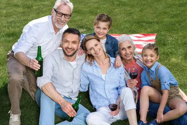Happy family at barbecue — Stock Photo