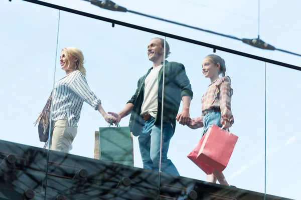 Family walking in shopping mall — Stock Photo