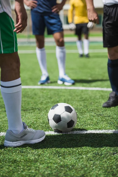 Soccer players at pitch — Stock Photo