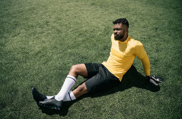 African american goalkeeper on pitch — Stock Photo