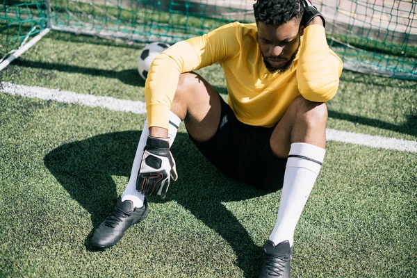 African american goalkeeper on pitch — Stock Photo