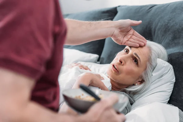 Man taking care of wife — Stock Photo