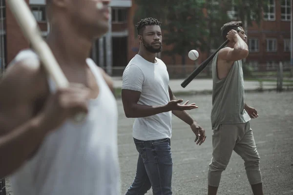 Multiethnic baseball players — Stock Photo