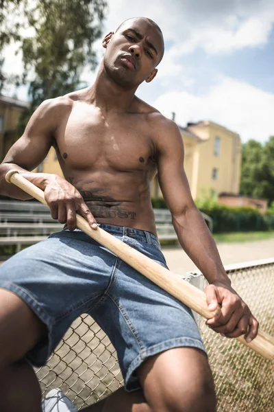 Man with baseball bat — Stock Photo