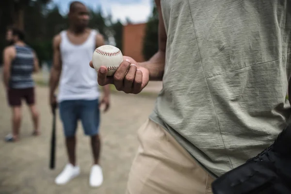 Man with baseball ball — Stock Photo