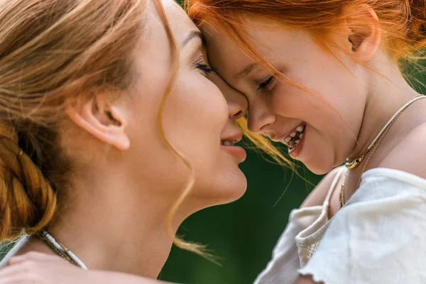 Beautiful happy mother and daughter — Stock Photo