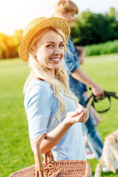 Young couple at picnic in park — Stock Photo