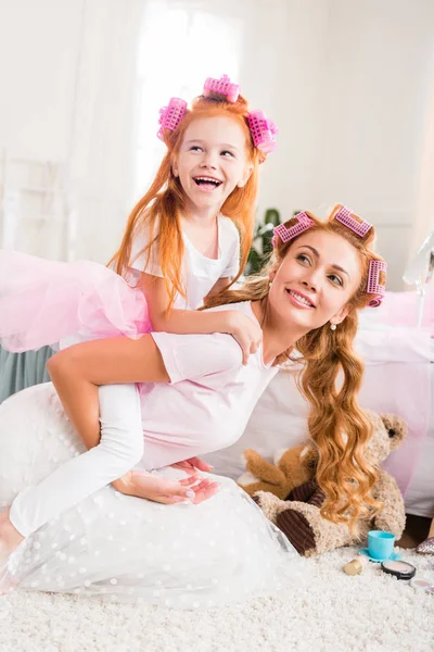 Family piggybacking together — Stock Photo